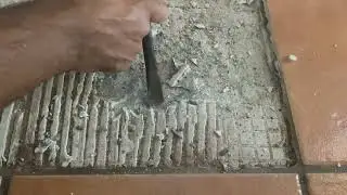 Chipping concrete for tile replacement preparation. Very satisfying.