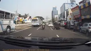 Doesn't red mean stop anymore? Sri Lankan Private bus blasts through the red light 