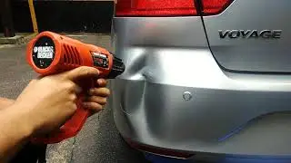 Como retirar amassado do Voyage com soprador térmico.