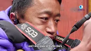 Disabled Tibetan photographer aims high