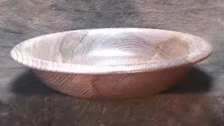 woodturning an ash bowl finished with gilding wax