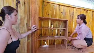Girl makes kitchen cabinets and kitchen shelves.