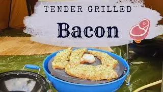 Tender grilled bacon. Camping kitchen.
