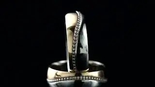 Комбинированные обручальные кольца по эскизу заказчика.