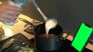 Close Up of Female Hands Pouring Tinned Milk into Saucepan 