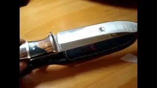 Нож