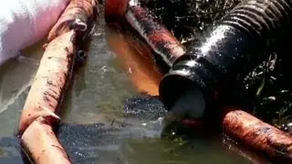 Oil pipeline bursts in suburb in Arkansas