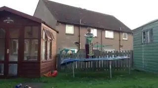 Pogo stick on trampoline challenge