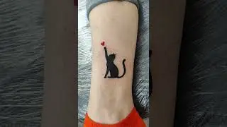 Тату кошка с сердцем