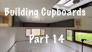 Putting in cupboards in my pop up camper
