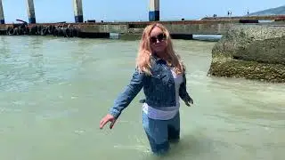 Elena takes a sea bath in cool water in spring from Russia
