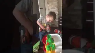 Baby working hard doing construction