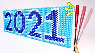 DESTROYING 2021 with baseball bat + 3,000 dominoes!