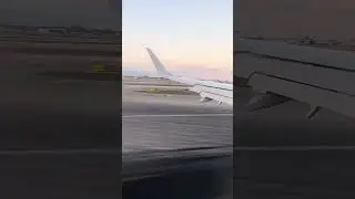 American airline aeroplane landing at miami airport, florida