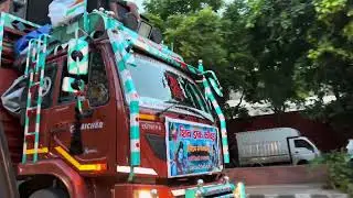Music Playing From a Large Truck in Traffic During a Relay