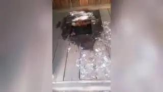 Мужик провалился в деревенский туалет