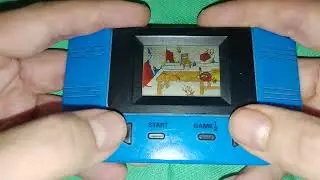Juego handheld lcd gato y ratón (con problema en pantalla).