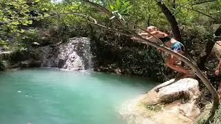 Exploring the Polylimnio Falls on SUP