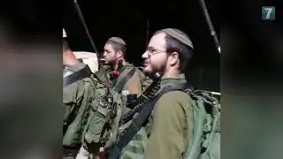 The soldiers enjoy a traditional Piyut on the field