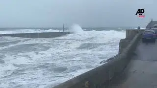 Cornish fishing port battered by powerful waves as weather warnings issued