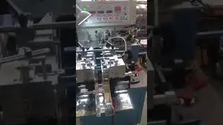 YS-3000 automatic fabric label cutting and folding machine centre fold test on printed care label