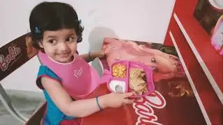 Eliza eating breakfast with cheese Breakfast and Plays