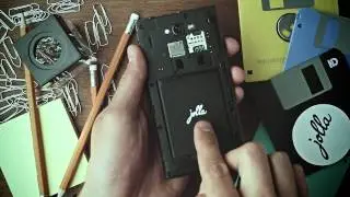 How to insert battery and SIM card