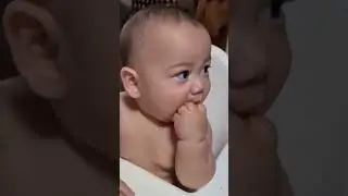 Brix enjoys eating his first solid food