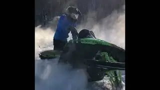 Deep powder snowmobiling in Saskatchewan
