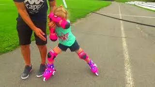 Аурика  с папой учится кататься на роликах.Aurika learn to roller skate.