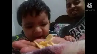 Baby eating potato chips