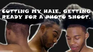 Cutting my hair, getting ready for a photo shoot￼.