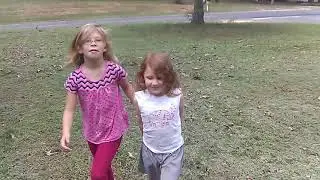 Girls playing cops and robbers