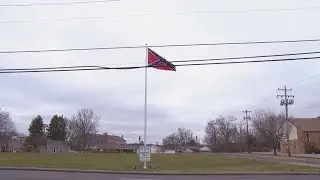 Confederate flag paired with welcome sign stirs controversy