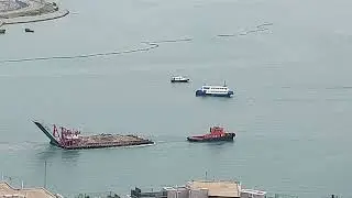 Every morning is a blessing,watching the tugboat pulling the floating crane full of sands