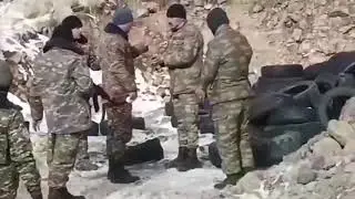 Армянские военные берут плен азербайджанцев