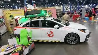 Toyota Ecto-1 car, proton packs, Slimer from Ghostbusters at Comicpalooza 2023