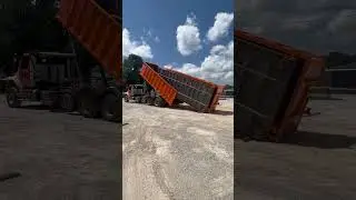Unloading New Roll off dumpsters triple stacked