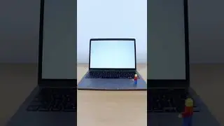 LEGO Minifigure typing on laptop