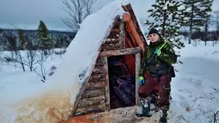 The hut is being built - The wall is being covered. The hut is covered in snow. I closed part of ...