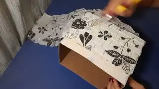 Reciclagem com caixa de papelão