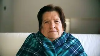 No Copyright Sick old woman shivering with a blanket around her shoulders | Stock Footage Video