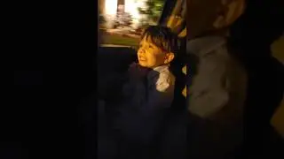 kayson seeing santa in a truck