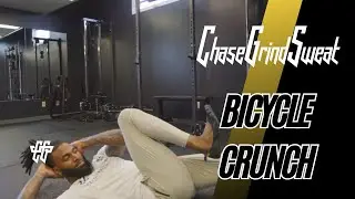 How to Bicycle Crunch - Exercise Tutorial | ChaseGrindSweat App