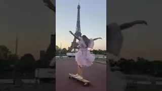 Girl Longboards on Streets of Paris While Wearing a Beautiful Dress During Sunrise