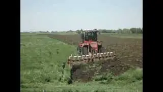 Steiger 600 quad & 12 bottom plow SD