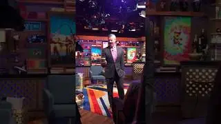 Andy Cohen plays with Boy Butter Gold during Watch What Happens Live!