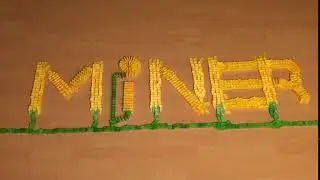 Dominoes falling in a Domino rally for minerdigi