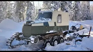 Repairing a tracked all-terrain vehicle right in the taiga