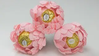 Flowers made of crepe paper with your own hands. Dahlia buds made of candy and paper.